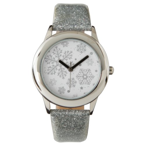 Silver snowflakes on white watch